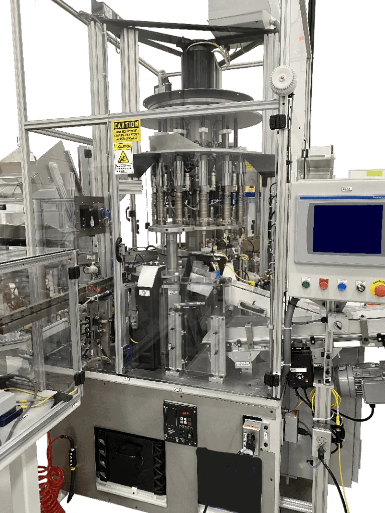 Continuous motion assembly machine with a rotary head and a touchscreen