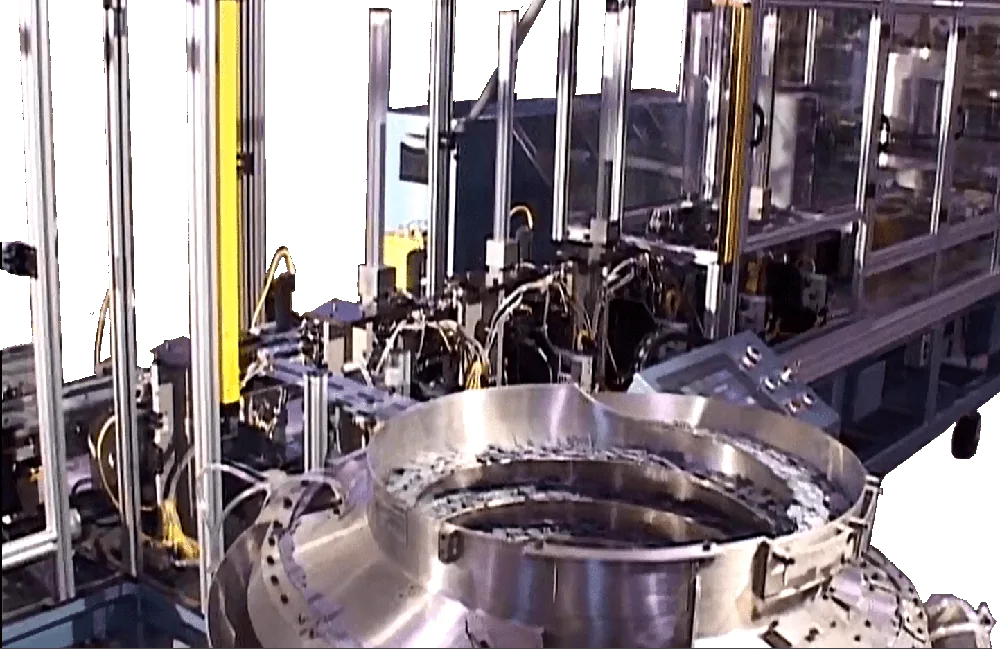In-line assembly machine with a stainless steel bowl feeder