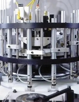 Close-up of rotary dial tooling on an assembly machine